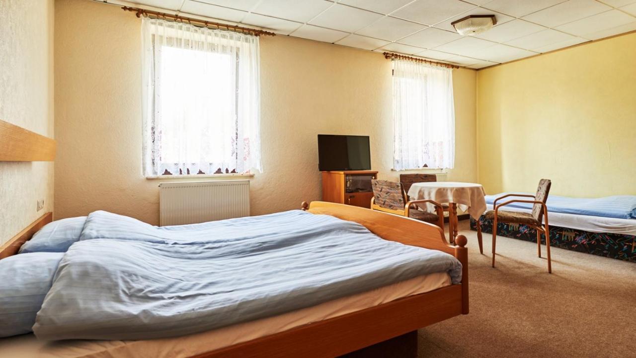 Dreibettzimmer mit eigenem Bad